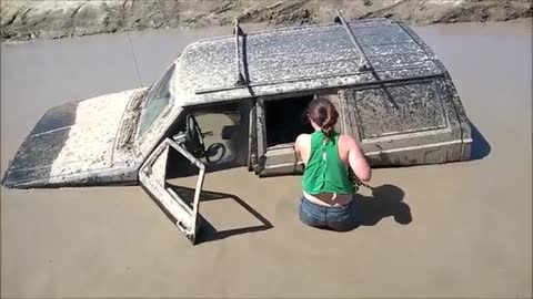 Silly girl sinks Jeep (360p)