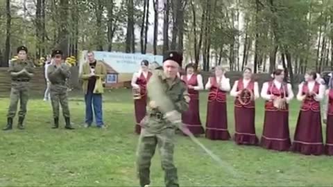 Russians being Russians playing with swords