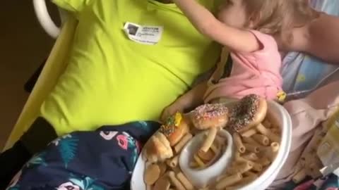 Kiddo Keeps Feeding Her Father