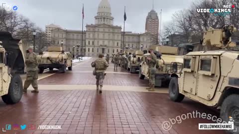 National Guard moving into position in front of the Michigan State Capitol Building