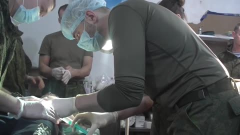 Russian servicemen provide medical assistance to civilians in Ukraine