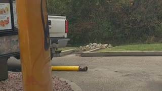 Truck in Taco Bell Drive-Through Takes Out Pole