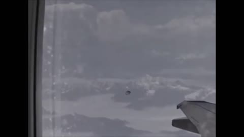 Unidentified Flying Object Follows An Airplane Over The Himalayas