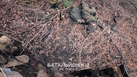 Ukrainian Fighters Make 'Action Film' Out Of Seizing Dead Russian Soldiers' Items In Bakhmut