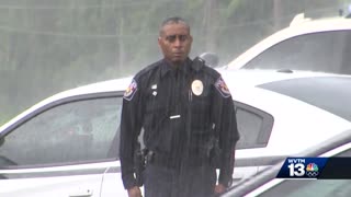 America the Beautiful at Her Core: Officer Braves Rain to Honor WW2 Vet