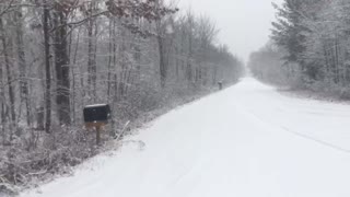 Snow walk Michigan along quiet road