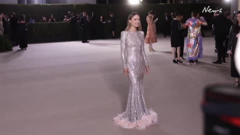 Olivia Wilde goes braless in sheer dress at Academy Museum Gala in LA