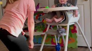 Big Sister Plays Peek-A-Boo With Brother