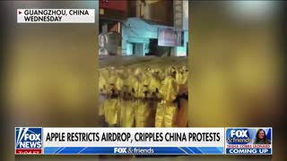 Apple CEO confronted over China protests