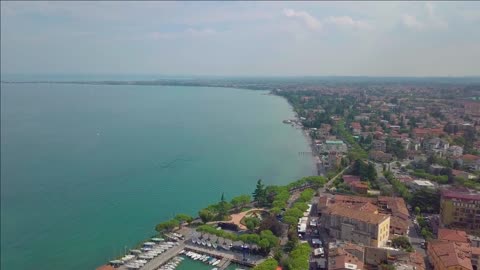 aerial view of boats and coast of lake garda italy