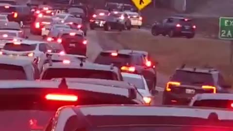 Pro-Palestine Hamas sympathizers block traffic on route to the airport in Chicago at Christmas