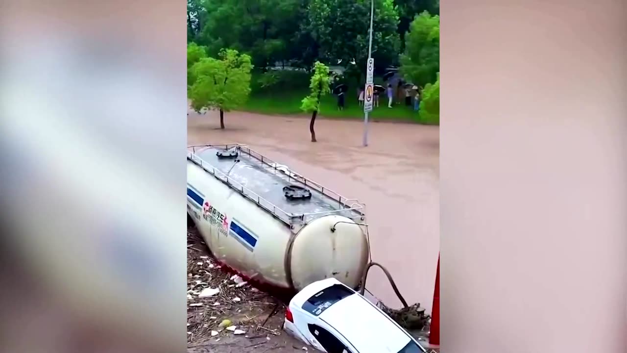 Flooding causes 'waterfall' in China's Chongqing