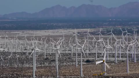 This is what it takes to make an electric car, solar panels and windmills