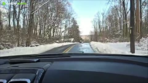 driving looking at snow