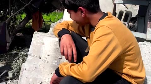 Innocent Child Mujahid Taha's Tears Flow as Israeli Warplanes Destroy his Family's Home in Gaza