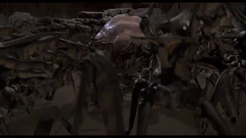 Rico saves his beloved and drives the leader of the arachnids out of the cave Starship Troopers