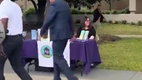 Grown men march around in red high heels to protest male violence against women