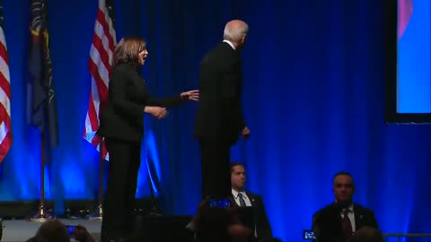 Joe Biden Gets Lost Again, Kamala Laughs Behind His Back As She Helps Him Find His Way Off Stage