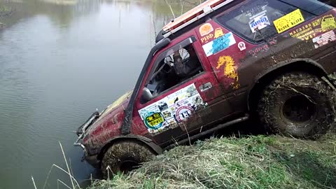 Trophy- raid Shkotovskaya carousel . Crossing the river