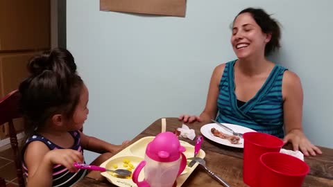 Dinner turns into adorable dance party with mom and toddler