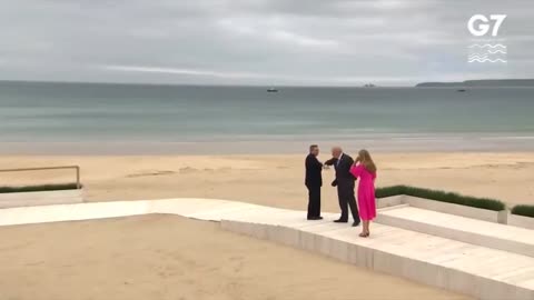 Prime Minister Boris Johnson and his wife Carrie Johnson greet the G7 leaders at Carbis Bay Beach