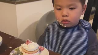 Young Boy Struggles to Stay Awake at Dinner