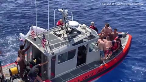 Coast Guard member shoots at shark headed right for colleagues during swim time