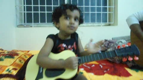 BABY GIRL SINGING WITH HER DAD ON GUITAR