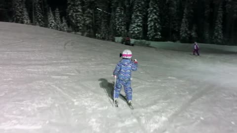 Talented Six-Year-Old Girl Tackles The Ski Slopes At Night