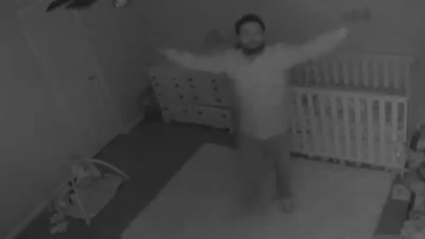Funny Dad Celebrates Putting Baby To Sleep By Bowing At The Baby Monitor