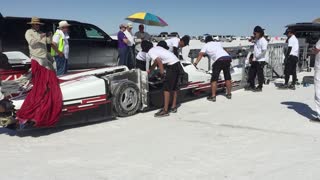 Honda Racing Pulling Streamliner Out of Trailer on Salt Flats