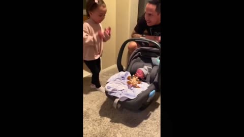 Emotional big sister meets baby brother for the first time