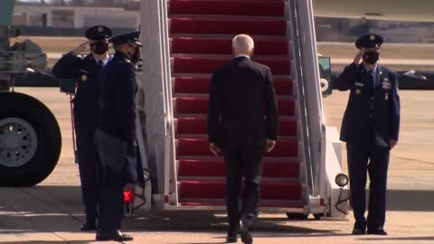 President Biden stumbles while boarding