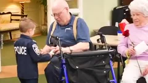 Young policeman serving the elders with love