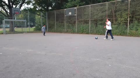 Kid foot ball training with papa