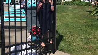 Daughter Struggles To Keep Gate Open