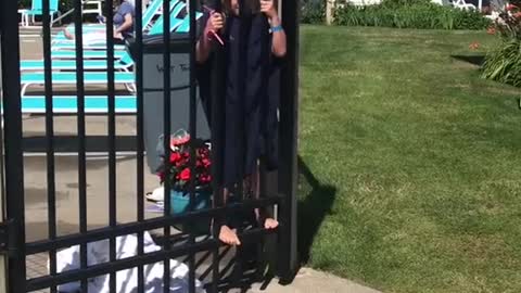 Daughter Struggles To Keep Gate Open