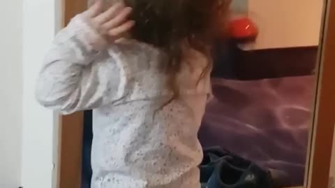 Toddler super excited about the mirror