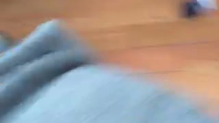 Dog tries hopping on sofa but falls