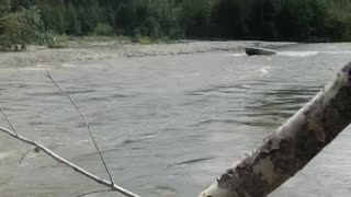 Boat Jumps River Blockage