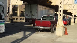 Semi Driver Tries to Pass Under Low Clearance Bridge, Fails