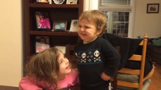 Adorable baby shocked sister won't kiss him