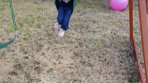 Little girl tries to eat a cloud