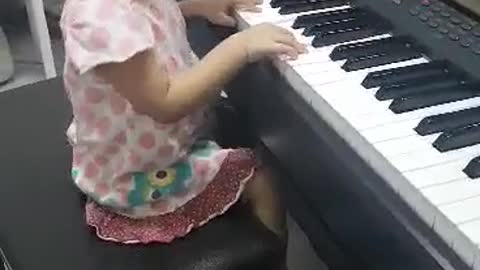 Baby dani playing piano