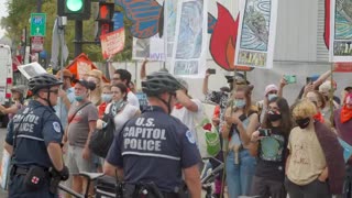'Which Side Are You On?': Climate Protestors Block Traffic And Face Arrest Outside Capitol