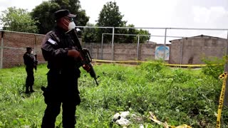 Dozens found dead at El Salvador ex-cop's home