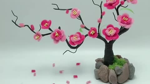 The beautiful artificial plum blossom is a work of art