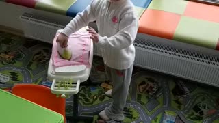 Little girl strokes linen