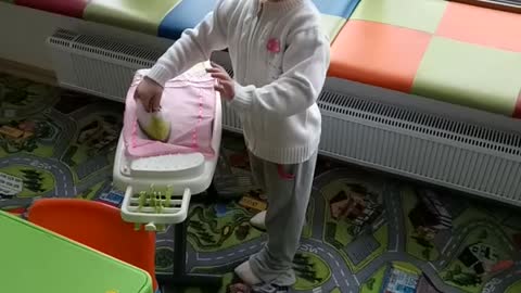 Little girl strokes linen