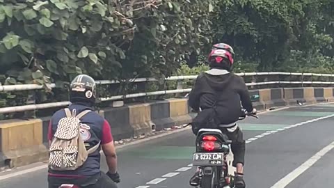 Guy Rides Mini Motorbike
